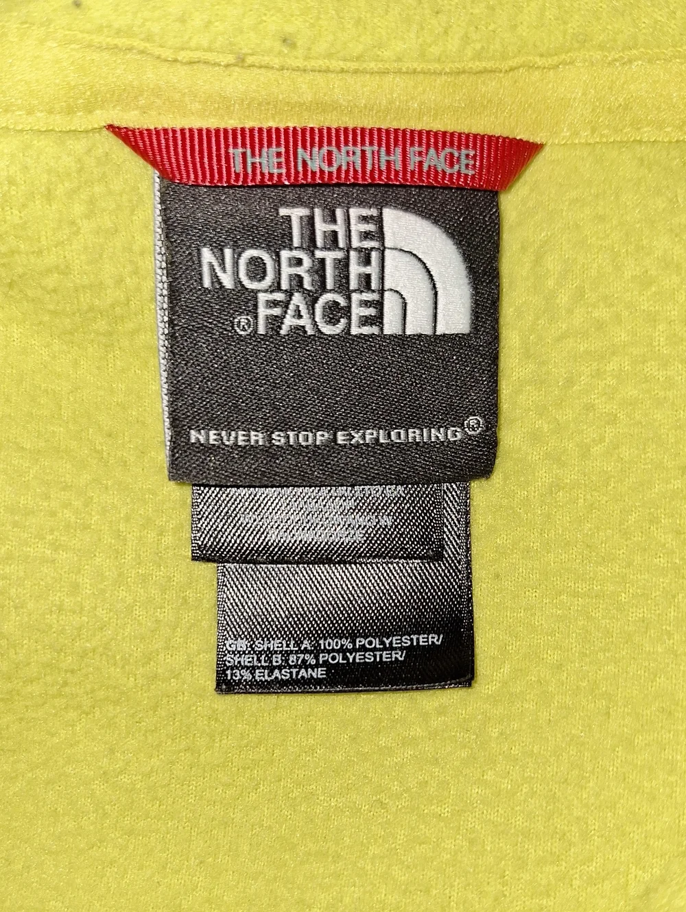 The North Face Bright Yellow Fleece with Black Logo Tag